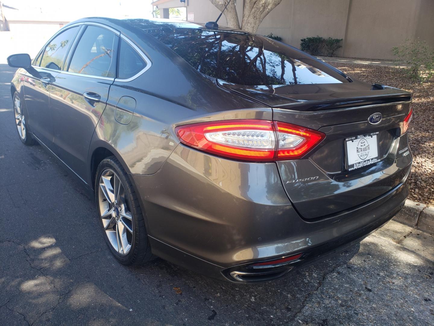 2016 /gray and black Ford Fusion titanium (3FA6P0K99GR) with an 2.0L L4 DOHC 16V engine, 4-Speed Automatic transmission, located at 323 E Dunlap Ave., Phoenix, AZ, 85020, (602) 331-9000, 33.567677, -112.069000 - 2016 Ford Fusion Titanium,......EXCELLENT condition, A Real Must See!!....ONLY 118K MILES,...... No accidents, Power everything, Touch screen Stereo/cd player, Phone sync, Bluetooth, Satellite compatible, Buckup camera, Navigation, Ice cold ac, Clean gray and Black interior with black leather seats - Photo#5